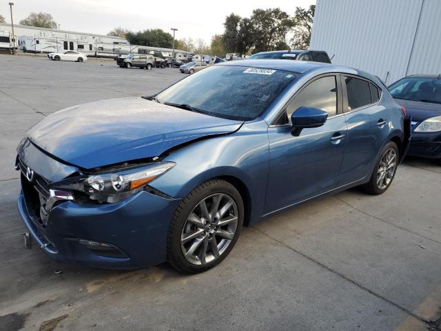 MAZDA 3 TOURING 2018 with VIN 3MZBN1L30JM209658 - Photo from auction