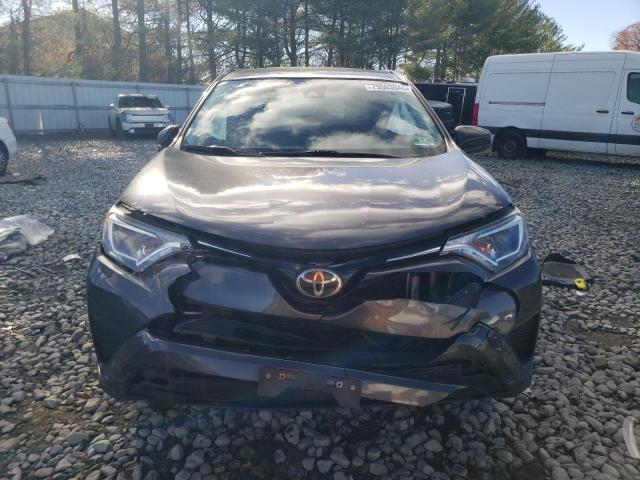 Photo 5 from auction – 2018 TOYOTA RAV4 LE with VIN JTMBFREV9JJ233211