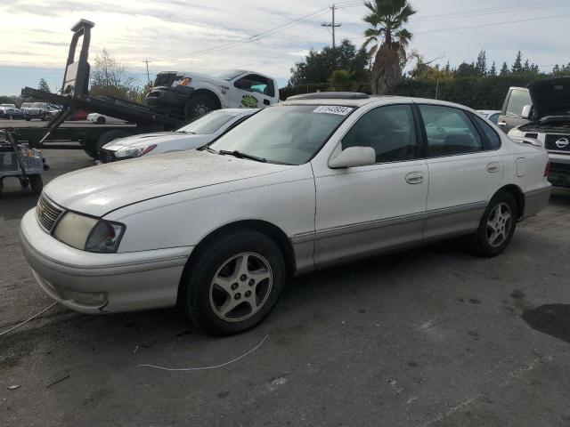 TOYOTA AVALON XL 1998 with VIN 4T1BF18B1WU269768 - Photo from auction