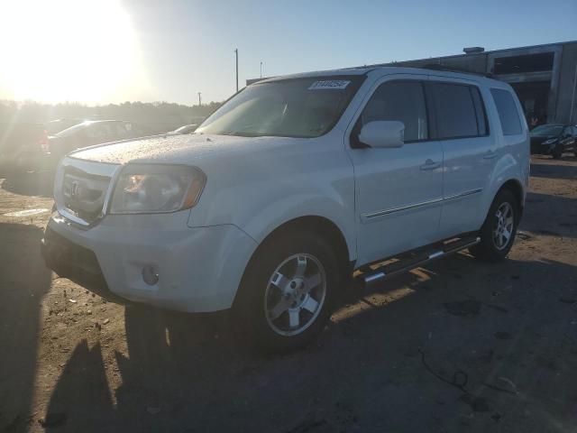 HONDA PILOT TOUR 2011 with VIN 5FNYF4H9XBB019767 - Photo from auction