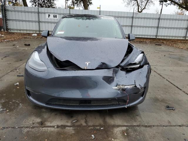 Photo 5 from auction – 2023 TESLA MODEL Y with VIN 7SAYGDED5PF949477