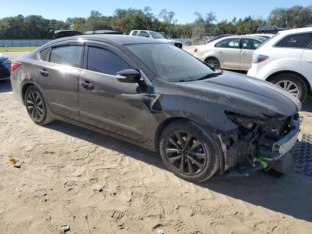 Photo 4 from auction – 2017 NISSAN ALTIMA with VIN 1N4AL3AP6HC180349
