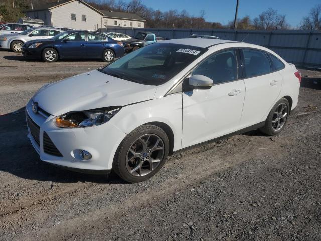 FORD FOCUS SE 2014 with VIN 1FADP3F26EL126057 - Photo from auction