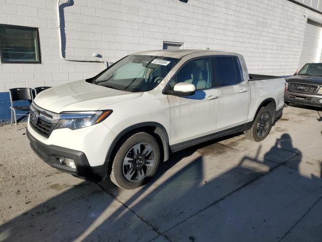 HONDA RIDGELINE 2020 with VIN 5FPYK3F57LB025699 - Photo from auction