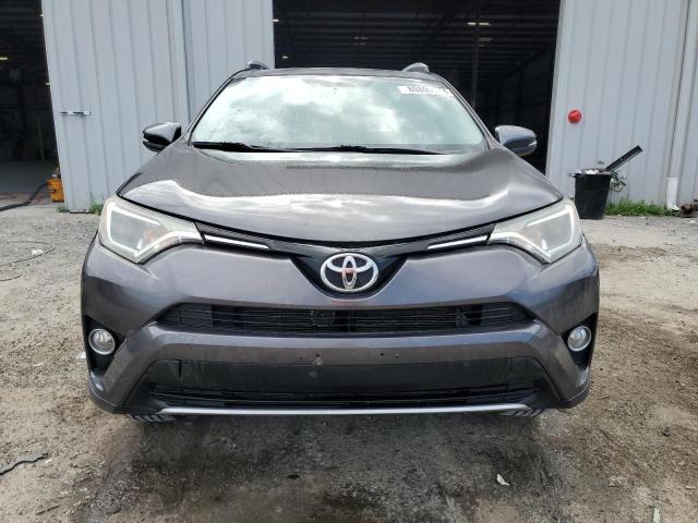 Photo 5 from auction – 2016 TOYOTA RAV4 XLE with VIN 2T3RFREV8GW515025