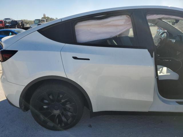 Photo 11 from auction – 2023 TESLA MODEL Y with VIN 7SAYGDEE9PA136102