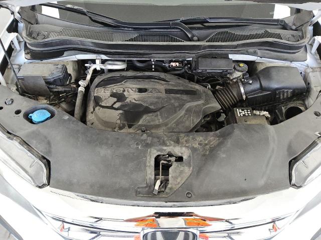 Photo 12 from auction – 2021 HONDA PILOT LX with VIN 5FNYF5H14MB005625