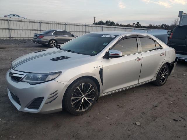 TOYOTA CAMRY HYBR 2014 with VIN 4T1BD1FK7EU137735 - Photo from auction