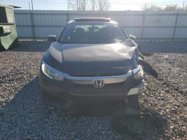 Photo 5 from auction – 2018 HONDA CIVIC EX with VIN 2HGFC2F76JH586249
