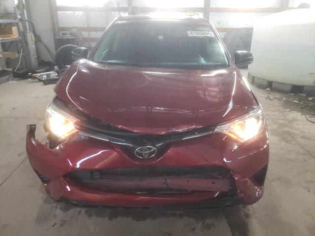Photo 5 from auction – 2018 TOYOTA RAV4 LE with VIN 2T3ZFREV2JW467044