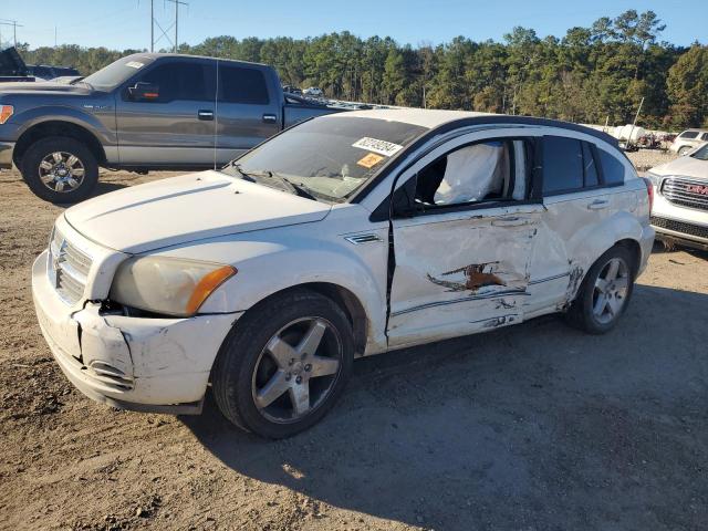 DODGE CALIBER R/ 2009 with VIN 1B3HB78B79D111213 - Photo from auction