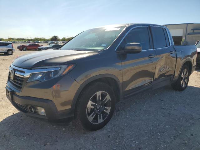 HONDA RIDGELINE 2020 with VIN 5FPYK2F54LB000611 - Photo from auction