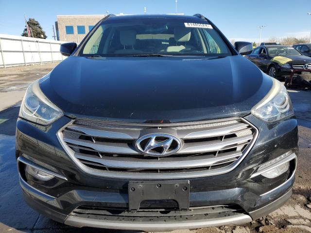 Photo 5 from auction – 2017 HYUNDAI SANTA FE S with VIN 5NMZU3LB9HH005185