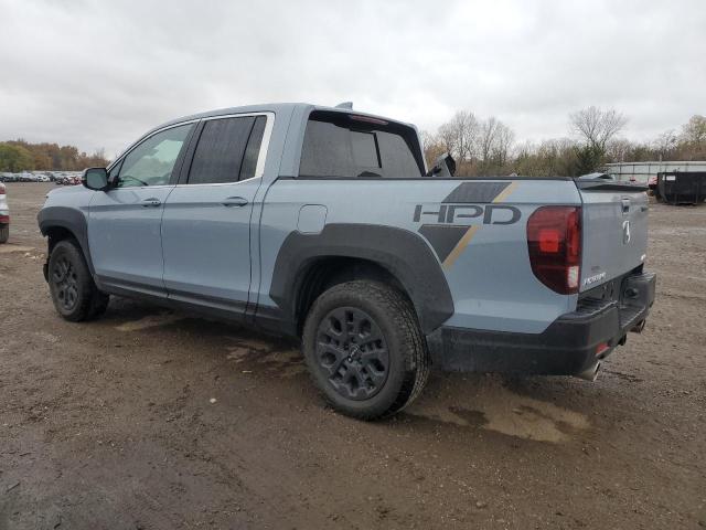 Photo 2 from auction – 2023 HONDA RIDGELINE with VIN 5FPYK3F59PB065336