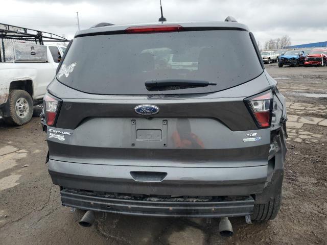 Photo 6 from auction – 2018 FORD ESCAPE SE with VIN 1FMCU9GD1JUC45202