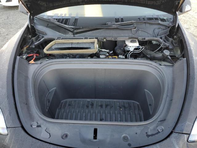 Photo 12 from auction – 2022 TESLA MODEL Y with VIN 7SAYGDEE7NF321362