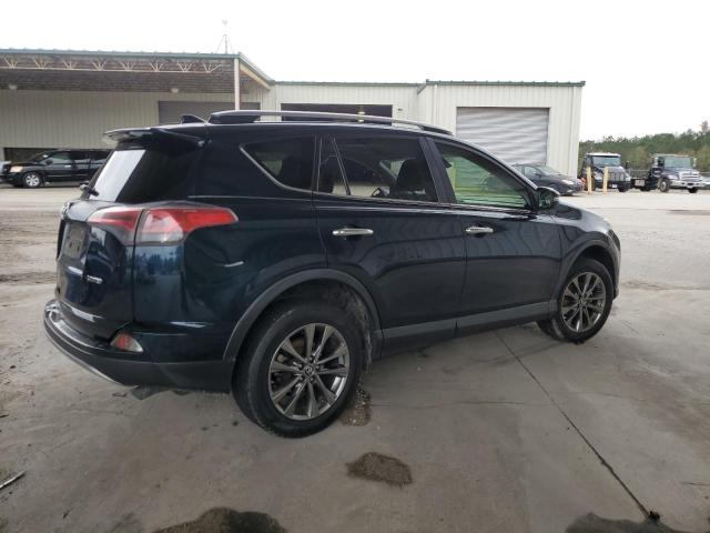 Photo 3 from auction – 2018 TOYOTA RAV4 LIMIT with VIN JTMYFREV3JJ732709