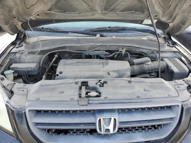 Photo 11 from auction – 2003 HONDA PILOT EX with VIN 2HKYF18463H521665