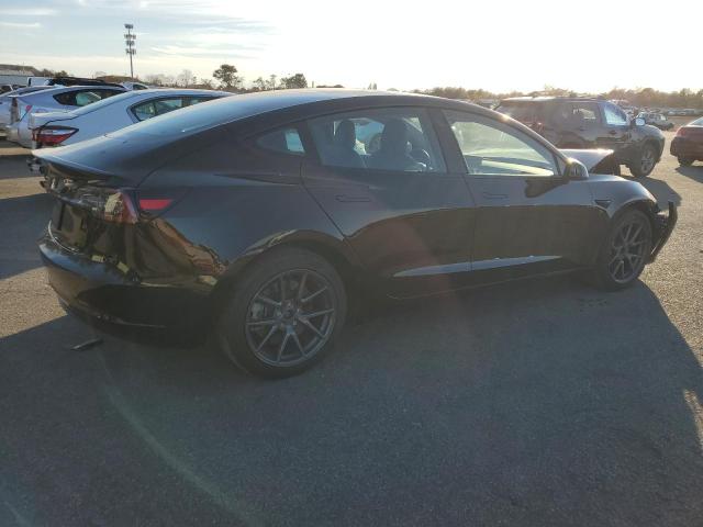 Photo 3 from auction – 2022 TESLA MODEL 3 with VIN 5YJ3E1EAXNF352582