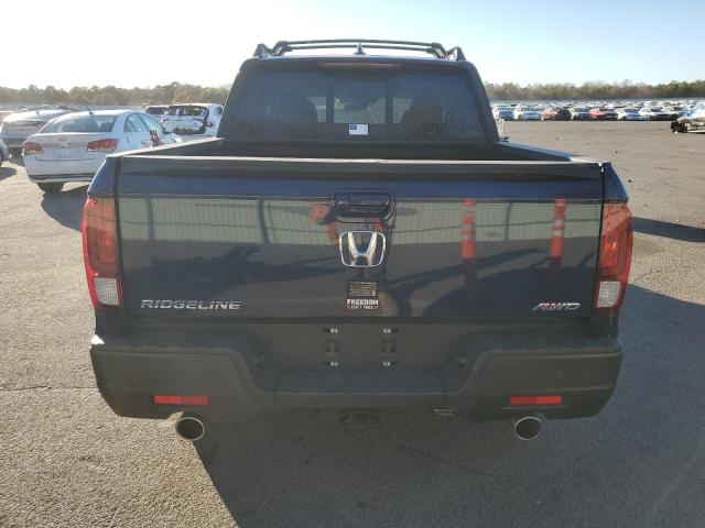 Photo 6 from auction – 2023 HONDA RIDGELINE with VIN 5FPYK3F58PB031792