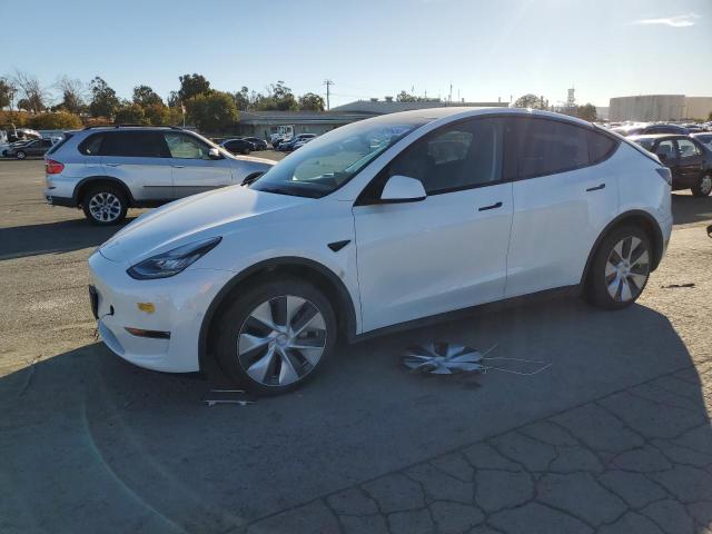 TESLA MODEL Y 2022 with VIN 7SAYGDEE0NF360312 - Photo from auction