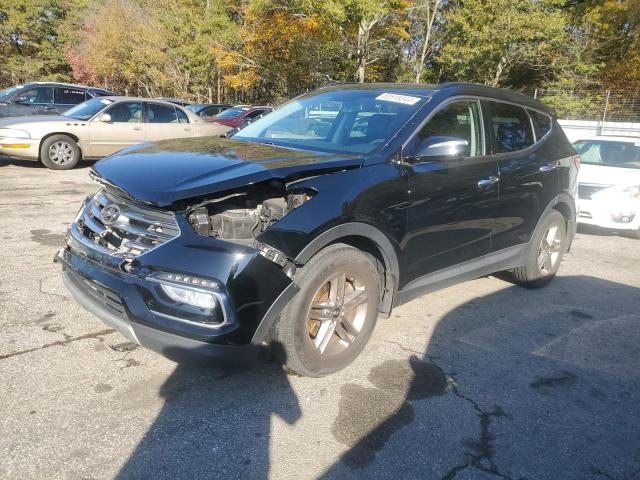HYUNDAI SANTA FE S 2018 with VIN 5NMZU3LB8JH098285 - Photo from auction