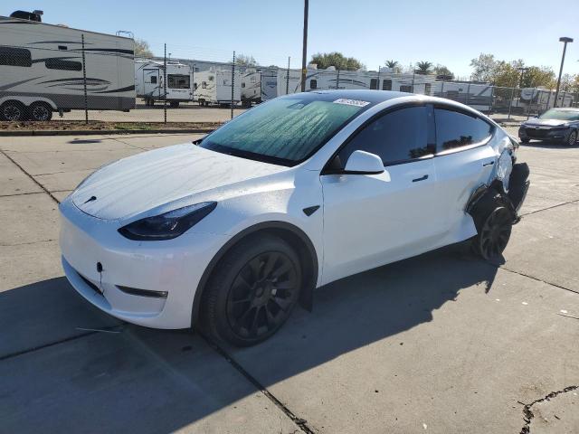 TESLA MODEL Y 2023 with VIN 7SAYGDEE6PF697828 - Photo from auction