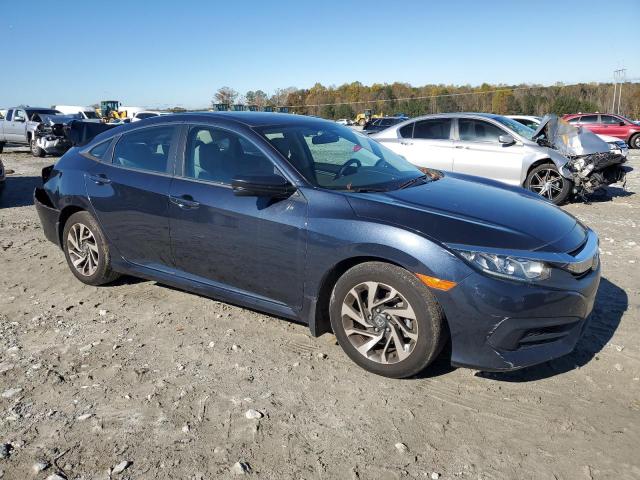 Photo 4 from auction – 2018 HONDA CIVIC EX with VIN 19XFC2F74JE001436