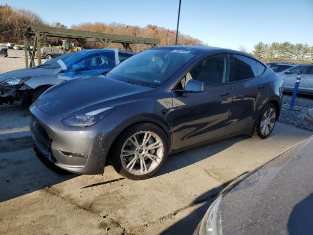 TESLA MODEL Y 2023 with VIN 7SAYGAEE7PF950170 - Photo from auction