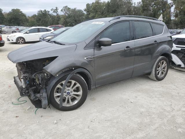 FORD ESCAPE SE 2018 with VIN 1FMCU0GD0JUA48825 - Photo from auction