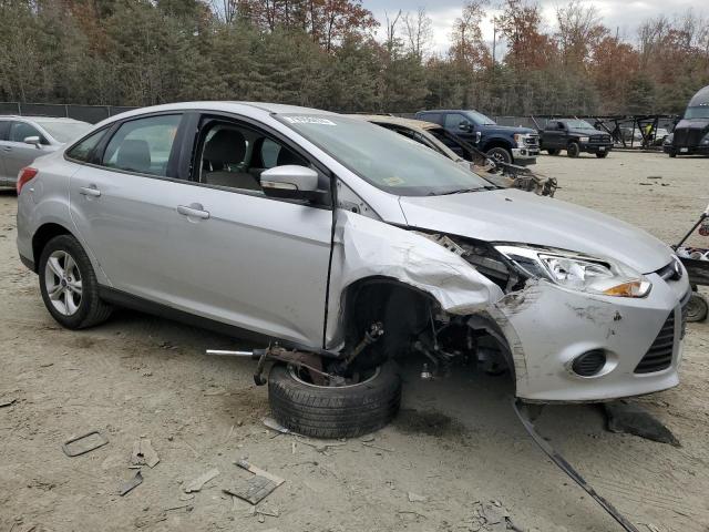 Zdjęcie 4 z aukcji – 2014 FORD FOCUS SE z VIN 1FADP3F24EL403613