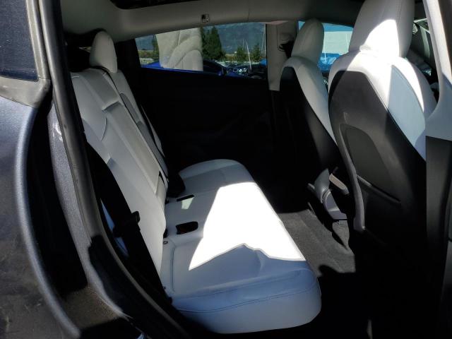 Photo 11 from auction – 2023 TESLA MODEL Y with VIN 7SAYGDEE9PF637283