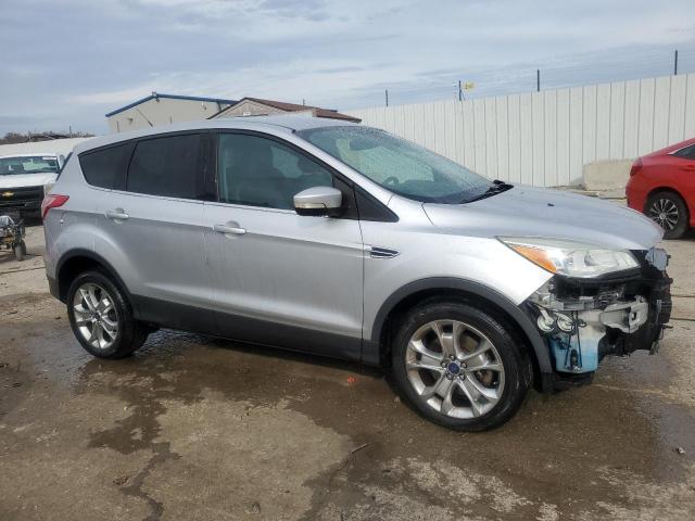 Photo 4 from auction – 2013 FORD ESCAPE SEL with VIN 1FMCU0H90DUC43578
