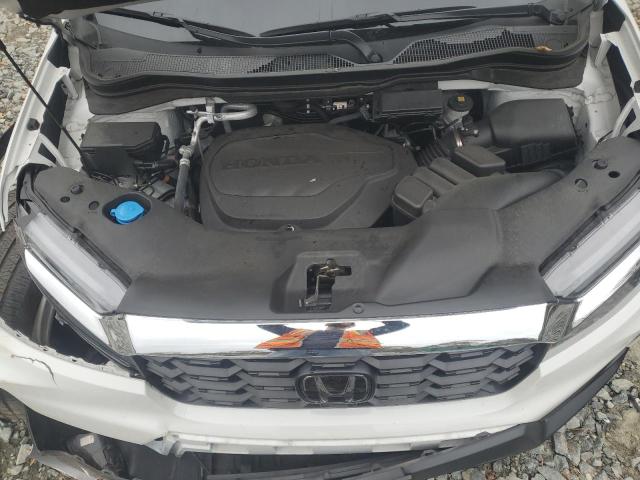 Photo 12 from auction – 2023 HONDA PASSPORT E with VIN 5FNYF8H50PB040929