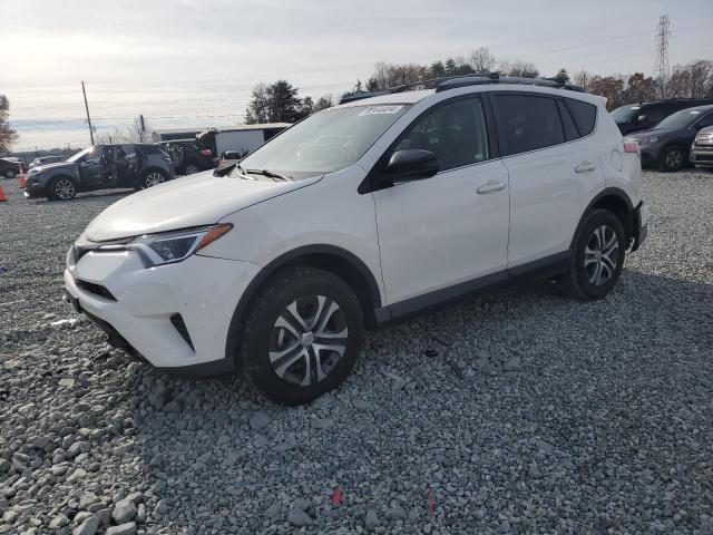 TOYOTA RAV4 LE 2017 with VIN JTMZFREV1HJ128686 - Photo from auction