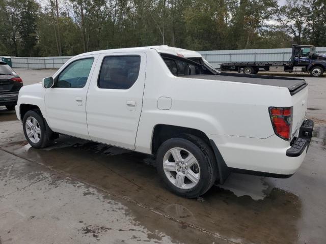 Photo 2 from auction – 2014 HONDA RIDGELINE with VIN 5FPYK1F53EB004842