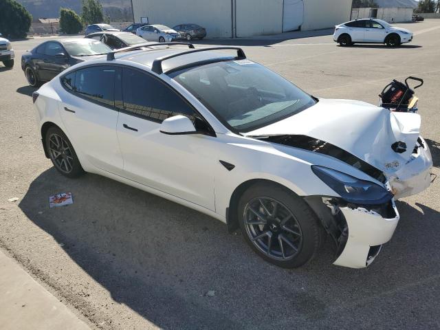 Photo 4 from auction – 2022 TESLA MODEL 3 with VIN 5YJ3E1EB0NF195475