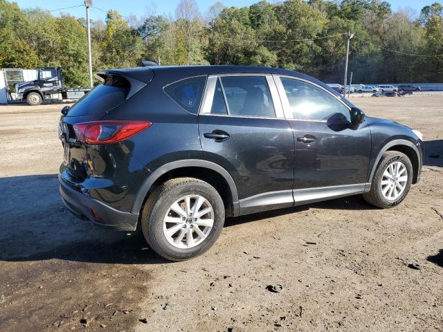 Photo 3 from auction – 2014 MAZDA CX-5 SPORT with VIN JM3KE2BE4E0388850
