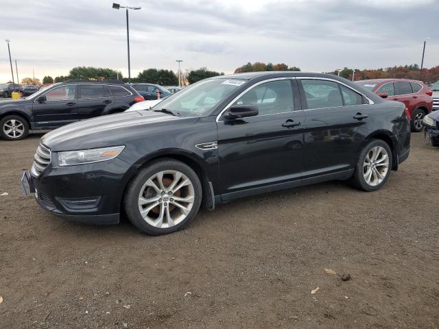 FORD TAURUS SEL 2013 with VIN 1FAHP2H86DG147415 - Photo from auction