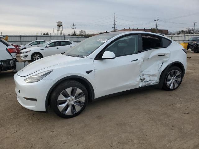 TESLA MODEL Y 2023 with VIN 7SAYGDEE8PA151254 - Photo from auction