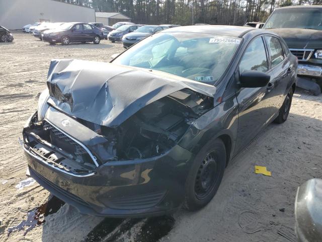 FORD FOCUS S 2015 with VIN 1FADP3E23FL272824 - Photo from auction