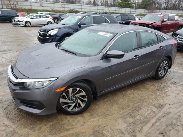 HONDA CIVIC EX 2018 with VIN 2HGFC2F7XJH501929 - Photo from auction