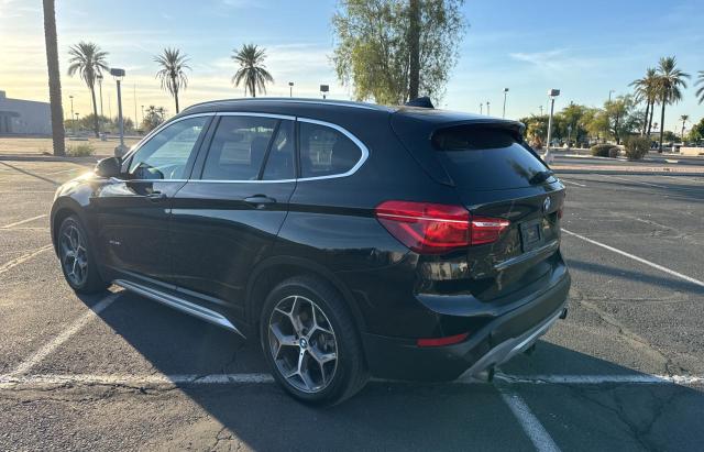 Photo 3 from auction – 2016 BMW X1 XDRIVE2 with VIN WBXHT3C33G5E54263
