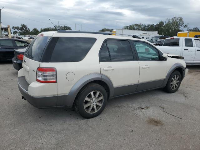 Photo 3 from auction – 2009 FORD TAURUS X S with VIN 1FMDK02WX9GA00925