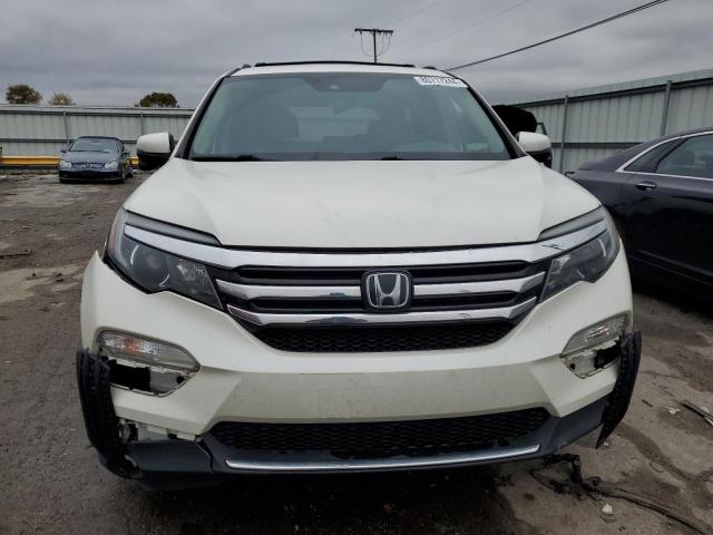 Photo 5 from auction – 2017 HONDA PILOT TOUR with VIN 5FNYF6H96HB050311