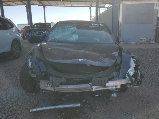 Photo 5 from auction – 2022 TESLA MODEL 3 with VIN 5YJ3E1EA1NF328249