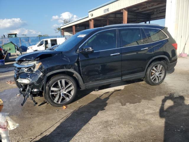 Photo 1 from auction – 2016 HONDA PILOT TOUR with VIN 5FNYF6H97GB105248