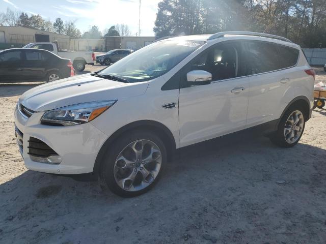 FORD ESCAPE TIT 2014 with VIN 1FMCU9J9XEUC39697 - Photo from auction