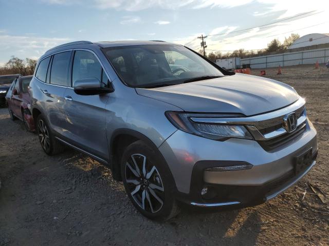 Photo 4 from auction – 2022 HONDA PILOT TOUR with VIN 5FNYF6H91NB010147