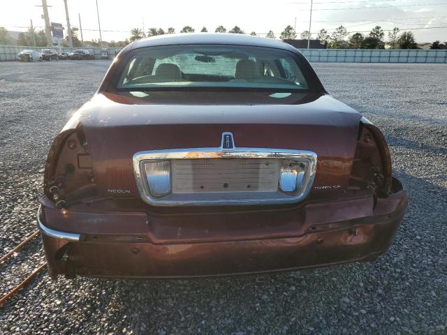 Photo 6 from auction – 2004 LINCOLN TOWN CAR E with VIN 1LNHM81W44Y648324